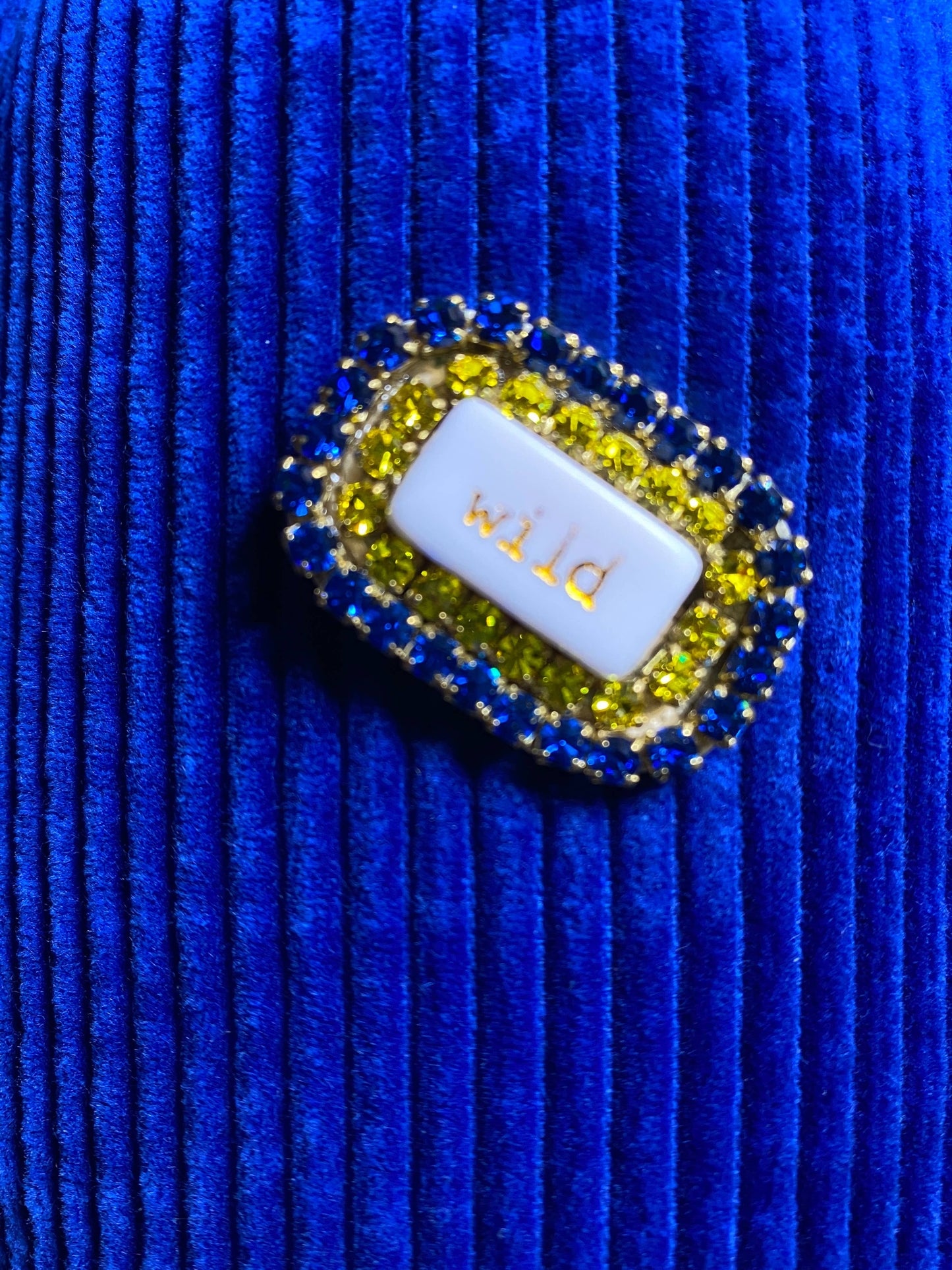 “WORD” rhinestone brooch