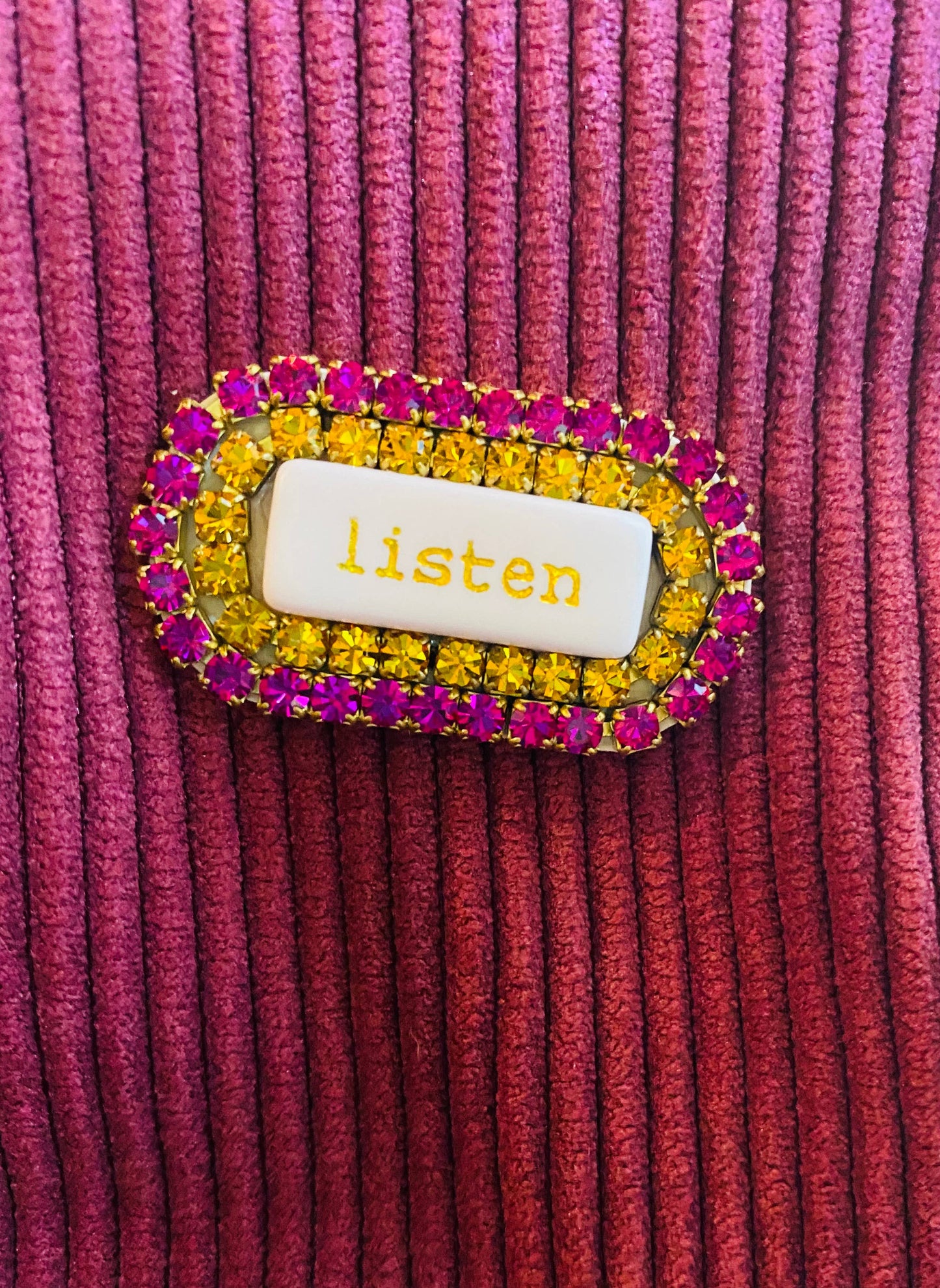 “WORD” rhinestone brooch