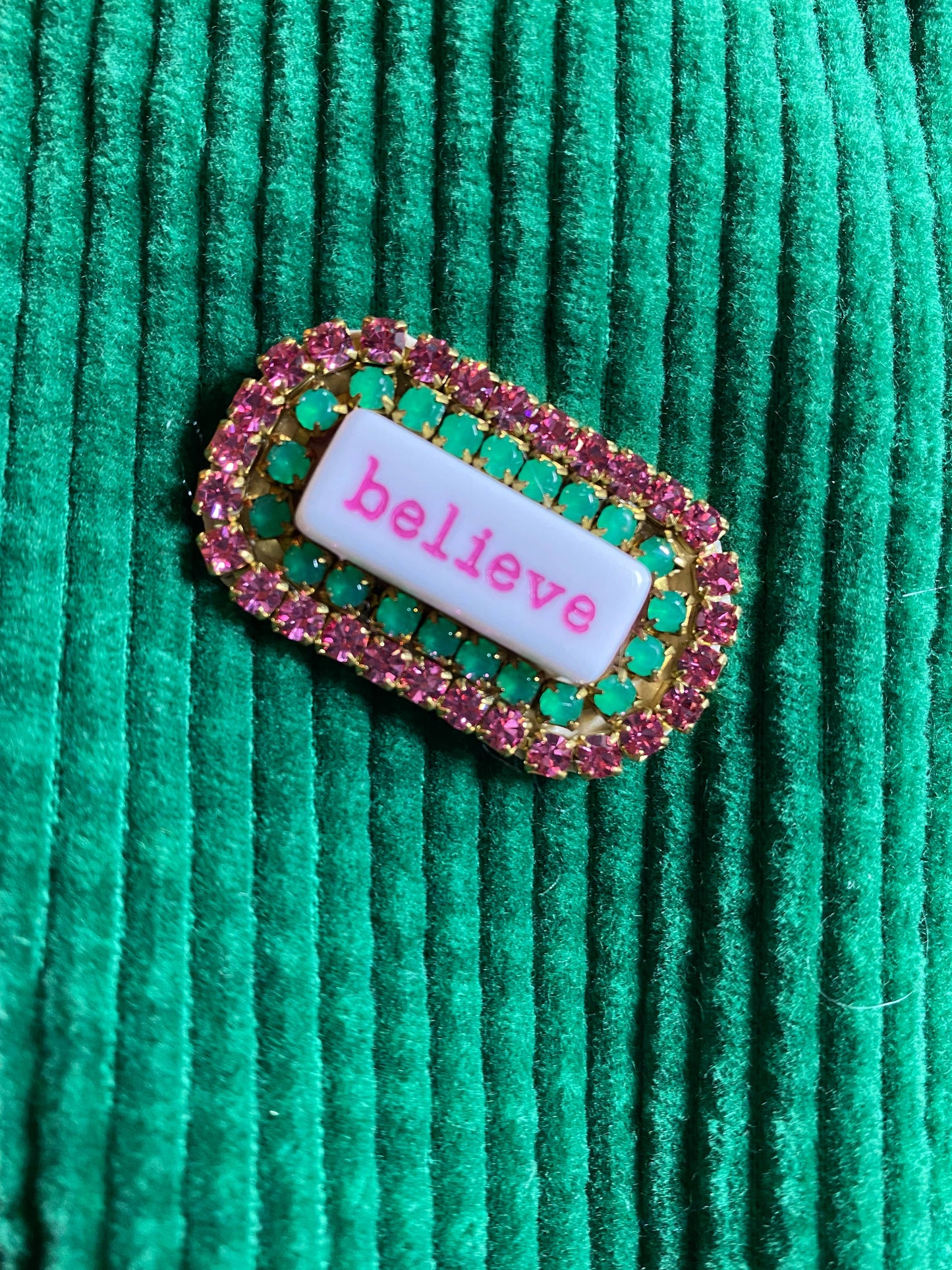 “WORD” rhinestone brooch