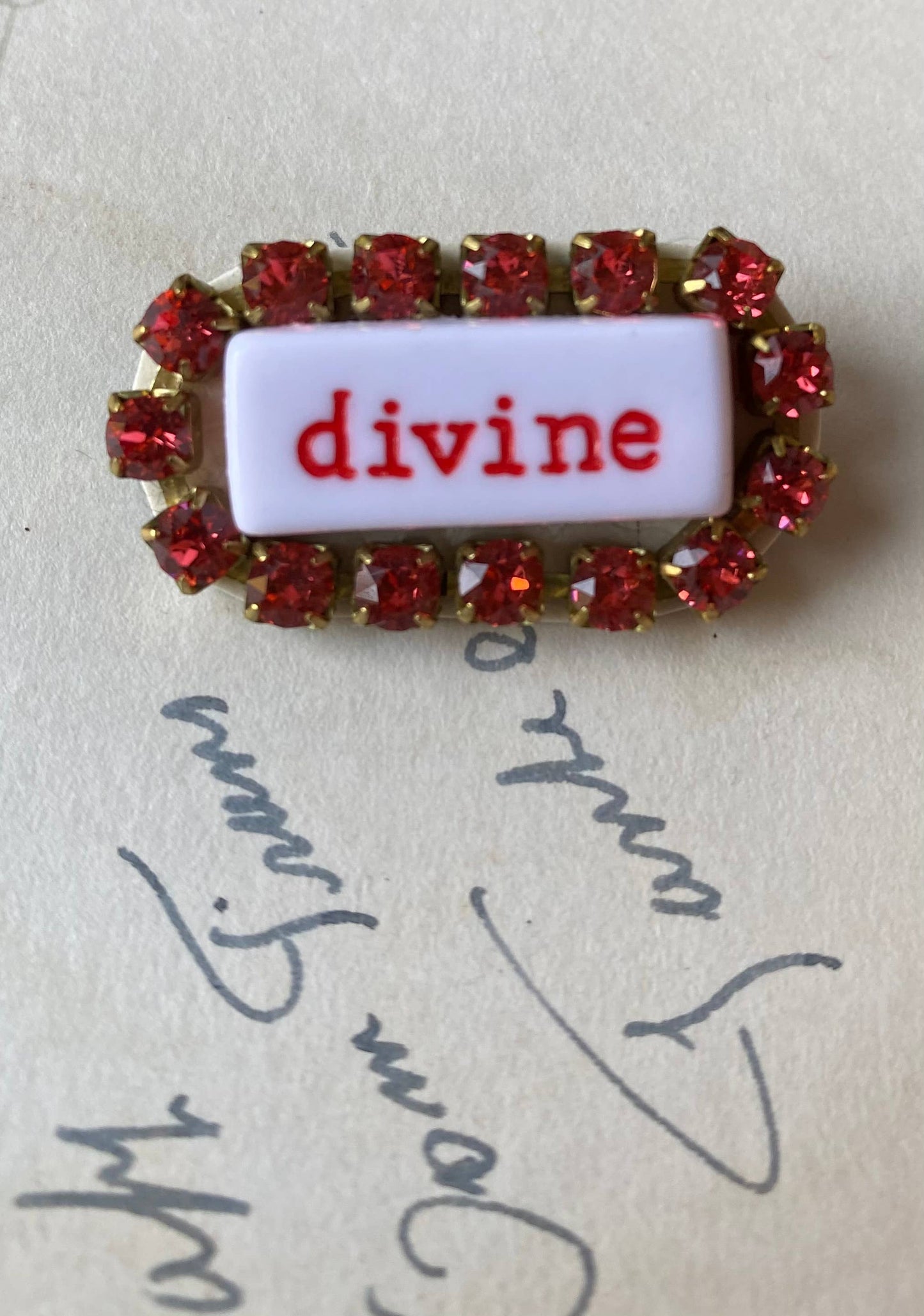 “WORD” rhinestone brooch