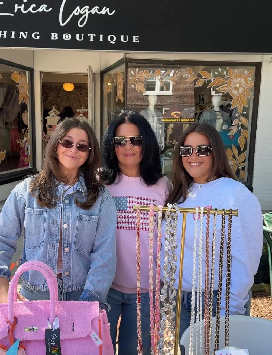 Tracy with her daughters Sidney and Andrea outside Erica Logan Clothing Boutique.